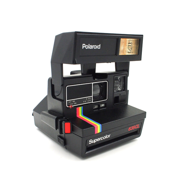 Polaroid Supercolor 635CL Instant Camera & FIlm package