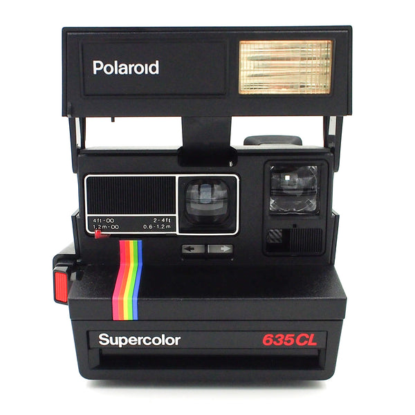 Polaroid Supercolor 635CL Instant Camera & FIlm package