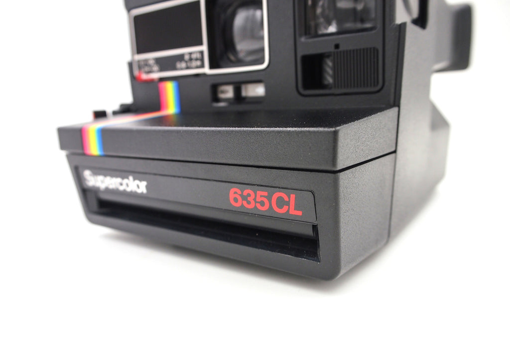 Polaroid Supercolor 635CL Instant Camera & FIlm package